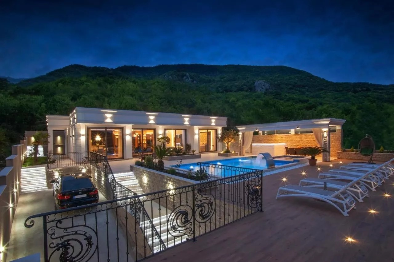 Nighttime picture of a luxury villa in Montenegro
