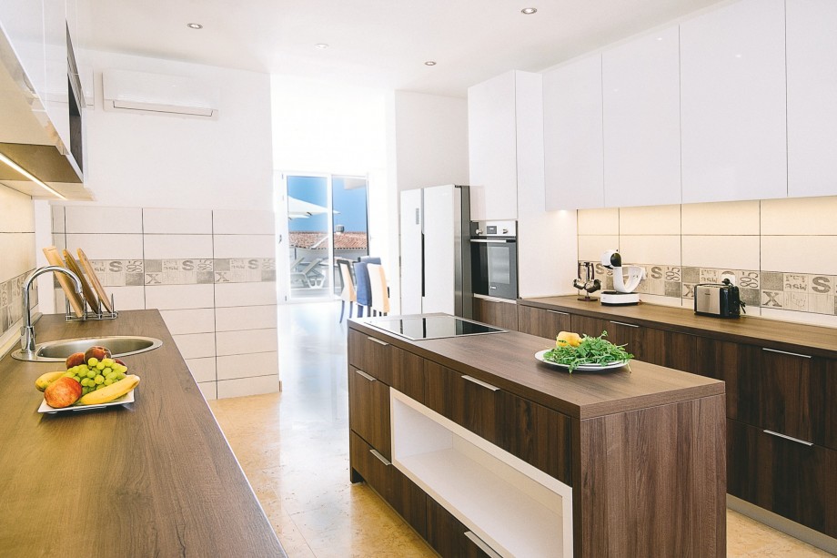 Spacious kitchen in villa