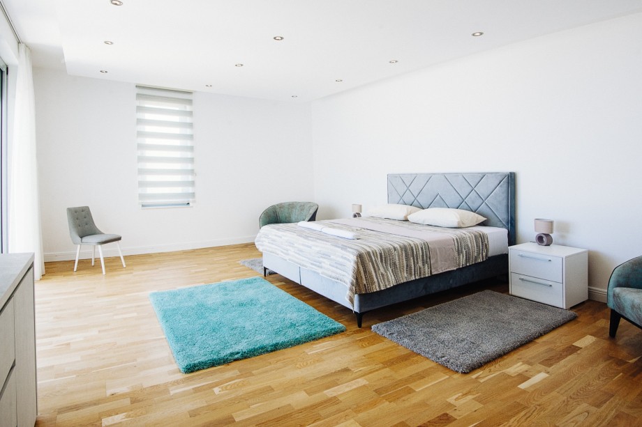 Spacious bedroom with king size bed