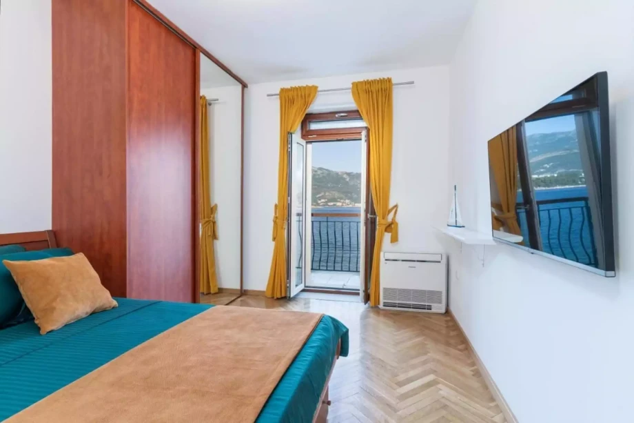 Bright bedroom with king size bed