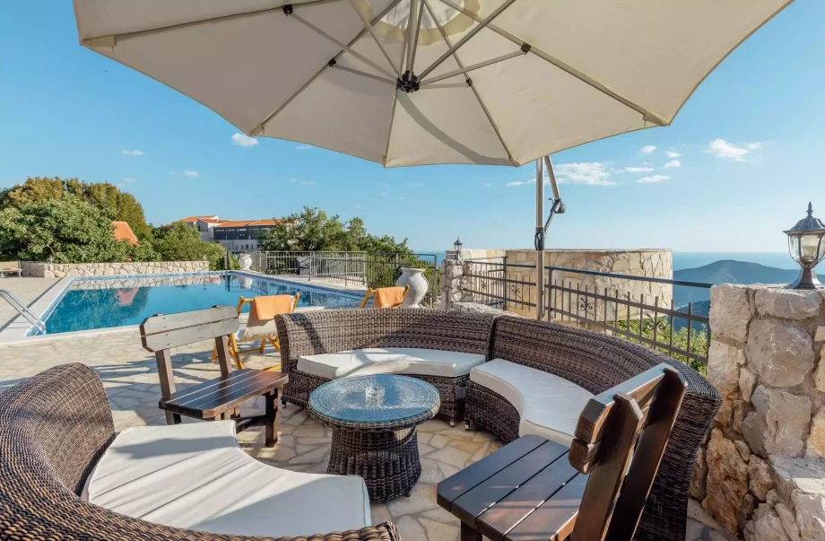 Beautiful outdoor area with private pool and furniture