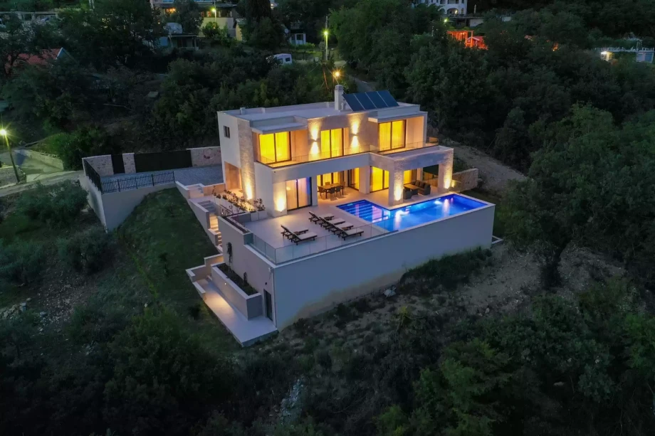 The exterior of Starfish Retreat Villa with lush greenery and private pool
