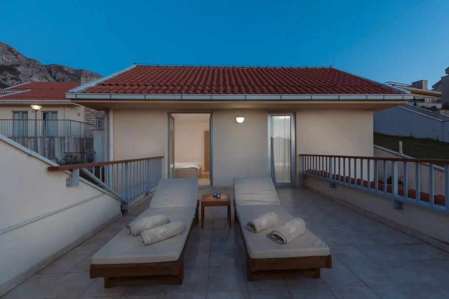 Relaxing Deck Chairs on Villa Blu Cobalto's Terrace with Stunning Views