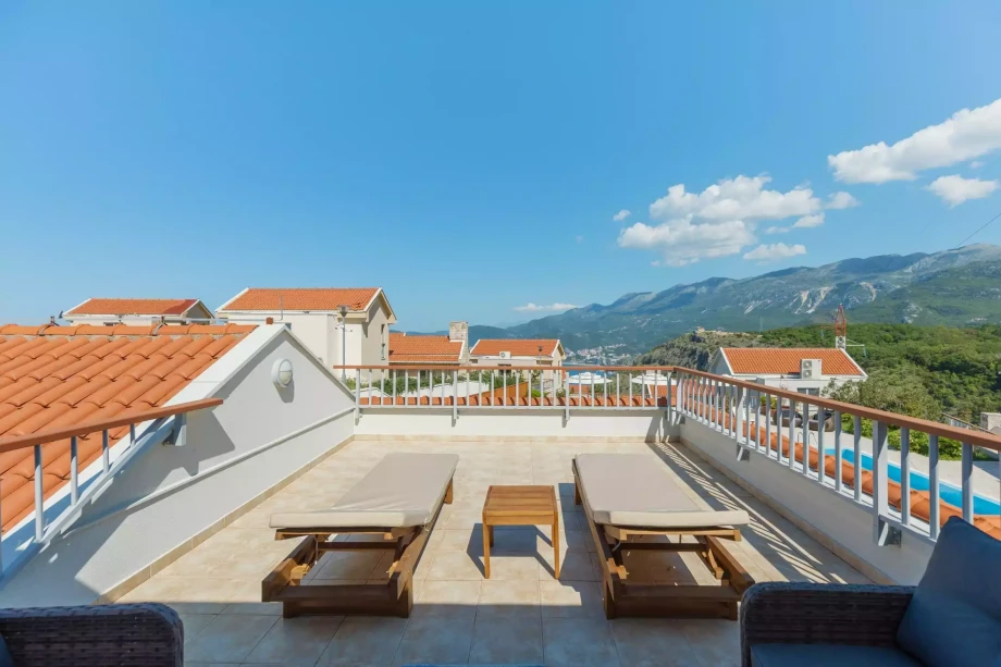 Terrace with Sunbeds and Scenic Views