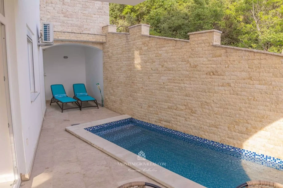 Comfortable deckchairs overlooking the pool