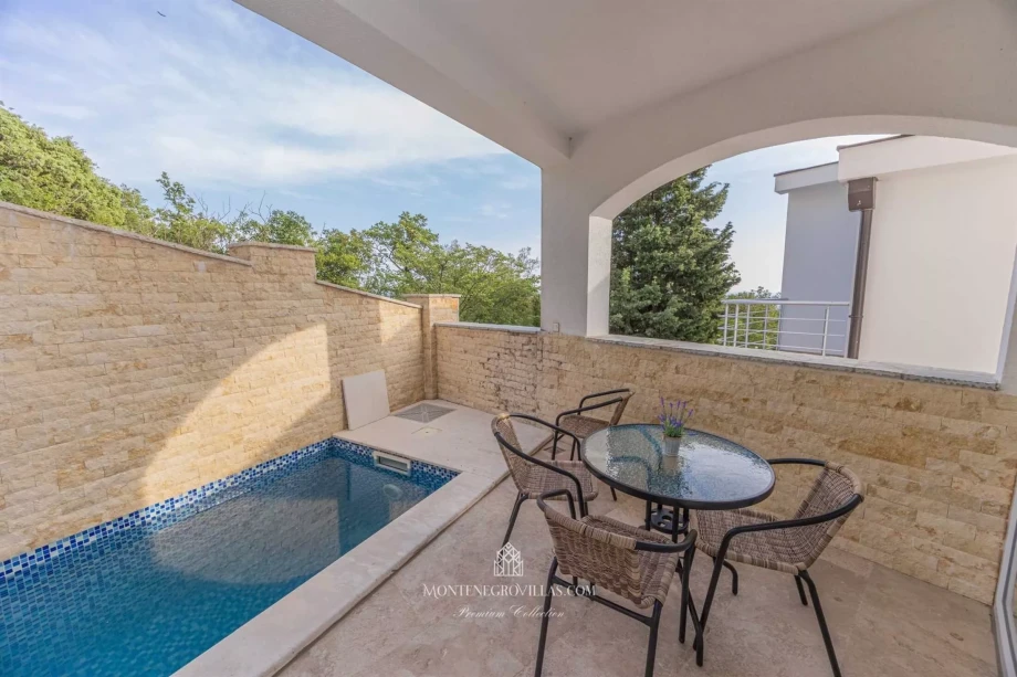 Outdoor table next to private pool