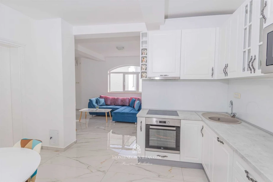 Pearl-white kitchen in a private Montenegro villa in Bar