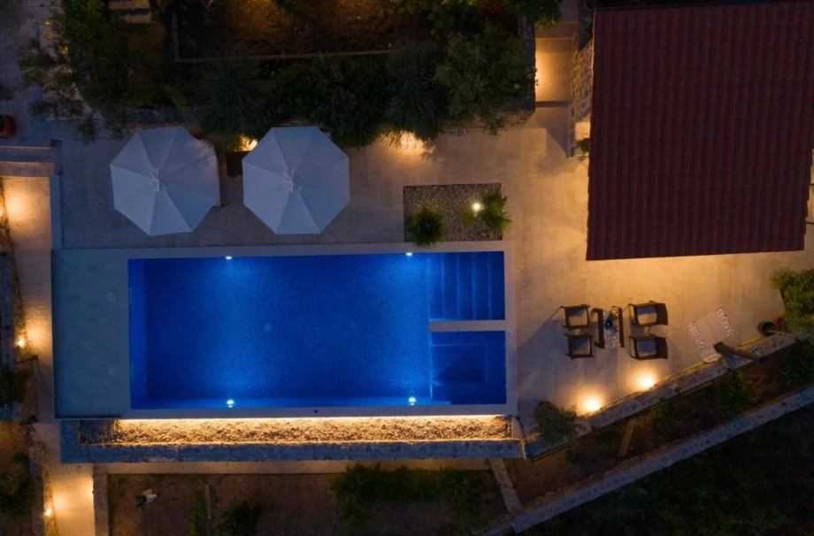 Outdoor private pool and the surrounding garden of Villa Eternal Flame