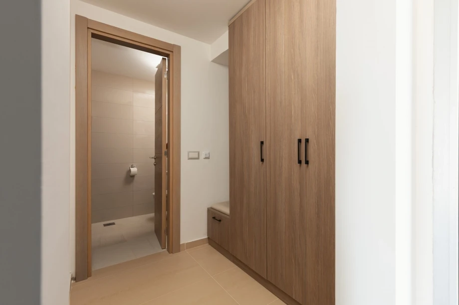 Spacious Hallway with Elegant Design and Natural Light