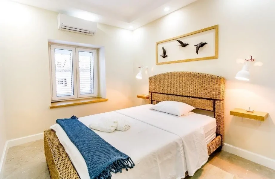 Beachfront Azure Hideaway Villa bedroom with views of the Bay of Kotor