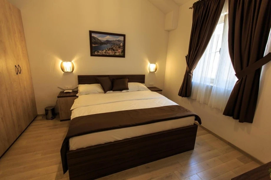 Room with large bedroom and wardrobe