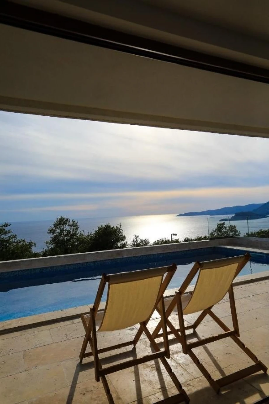 Outside pool with an amazing view of the sea and St. Nicholas Island in Budva