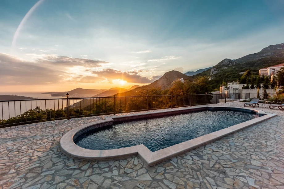 Pool of a Montenegro luxury villa during an amazing sunset