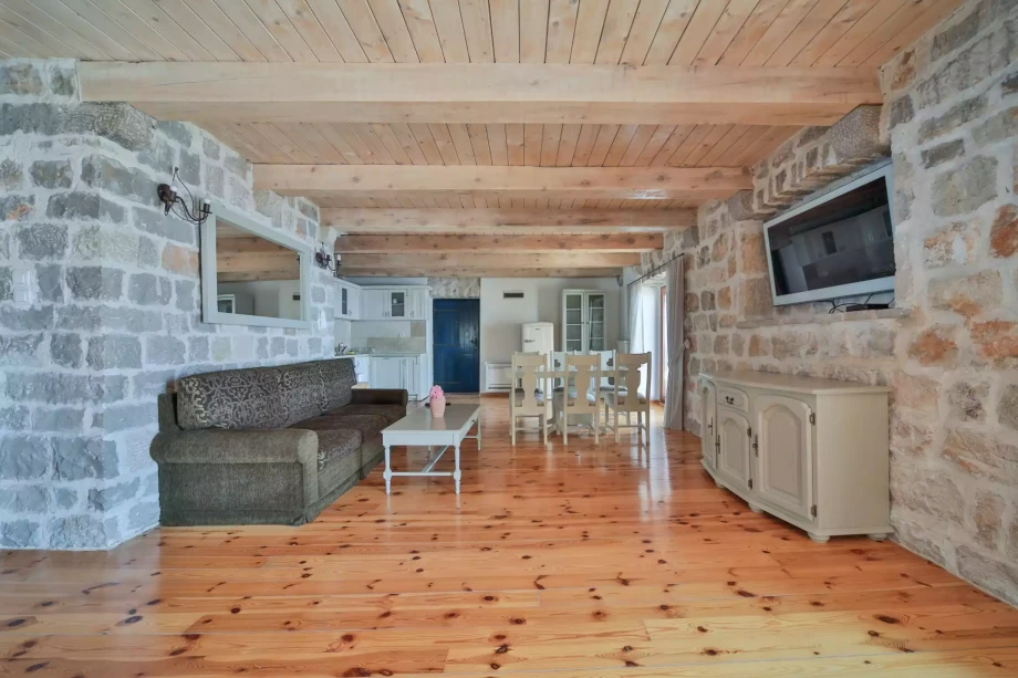 Lounge area with big smart TV in a luxury villa for rent in Petrovac