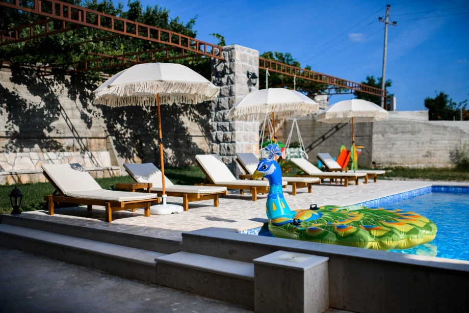 An outdoor swimming pool in Villa Sunray