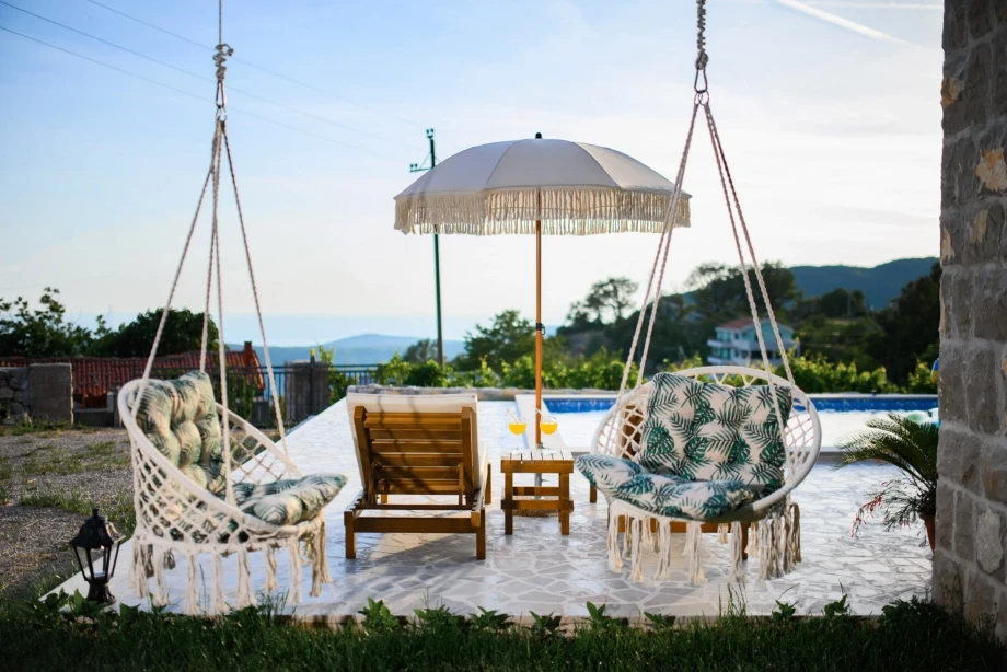 Hammocks near the outside pool of Villa Sunray