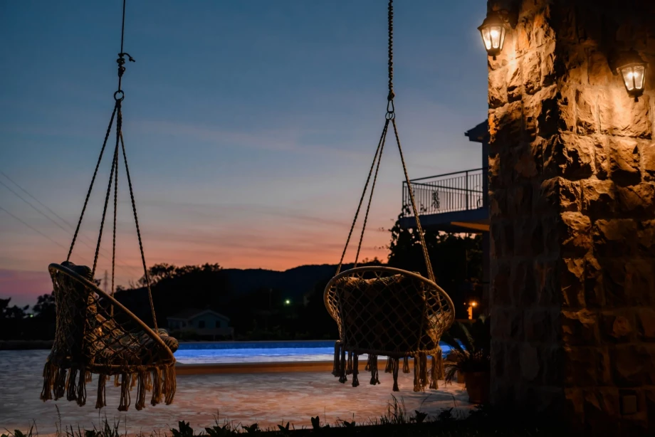 An outdoor pool, hammocks and a beautiful sunrise in Villa Sunray