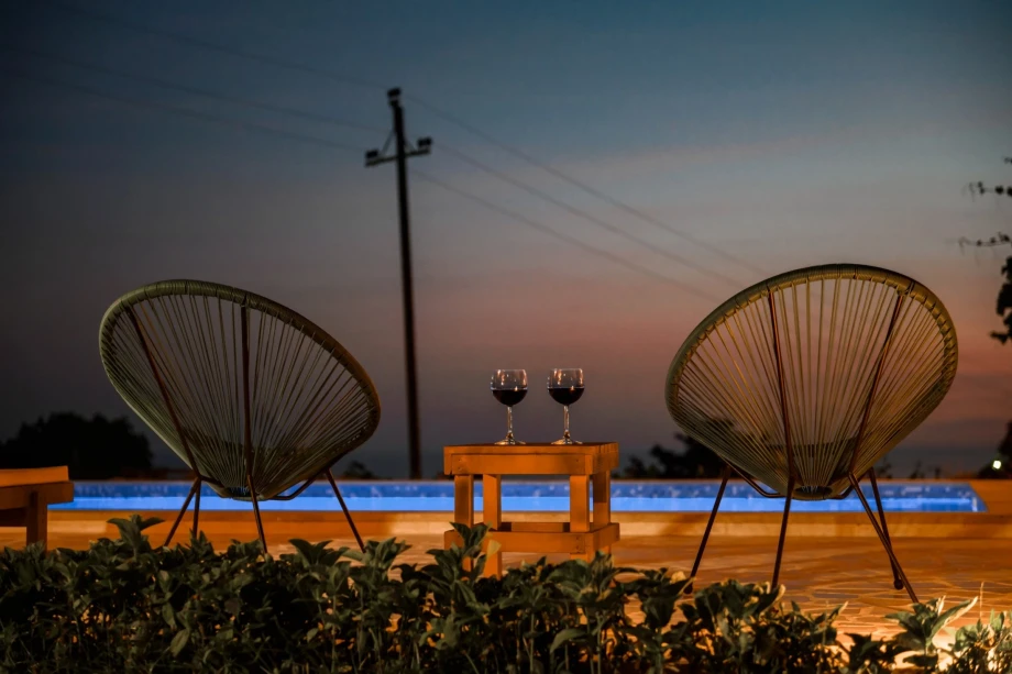 Glasses of wine and a sunset in Villa Sunray