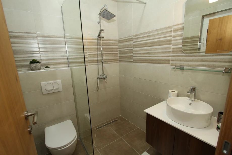 Bathroom with a walk in shower in a Montenegro villa rental