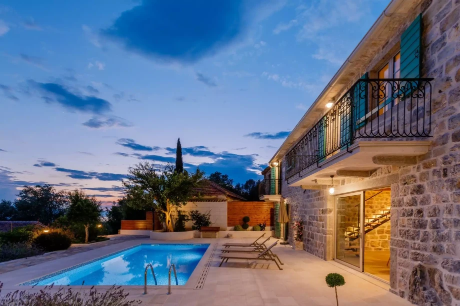 Outdoor private pool in Villa Poetica in Kotor during a beautiful sunset