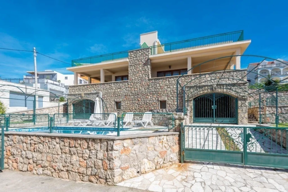 The stunning exterior of a Montenegro villa villa for rent with a pool