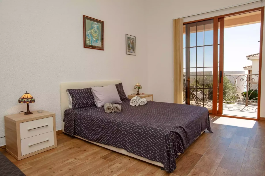 Modern Bedroom with Abundant Sunlight and Terrace Access at Villa Meringue