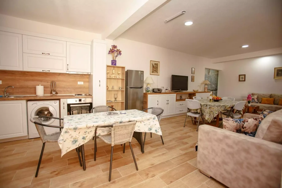 Inviting Interior Featuring a Kitchen, Dining Areas, and Comfortable Sofas at Vanilla Meringue Villa
