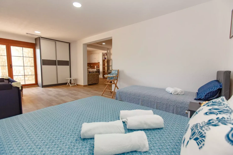 Spacious Guest Bedroom with Several High-Quality Beds at Villa Vanilla Meringue