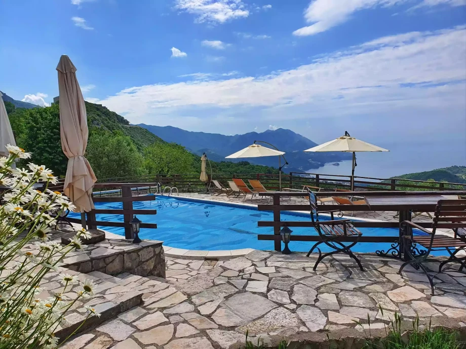 Luxury stone outdoor pool which gazes at the coast of Montenegro