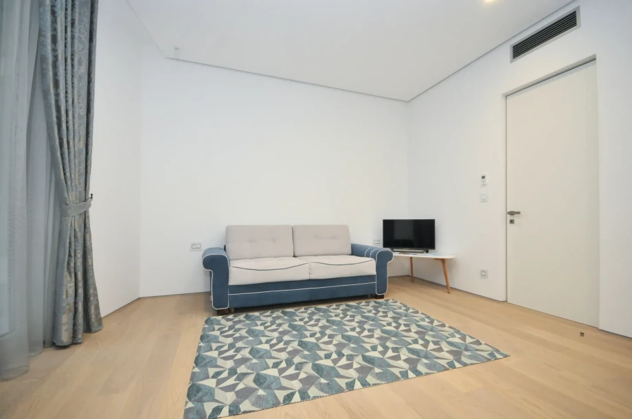 Comfortable sofa in bedroom