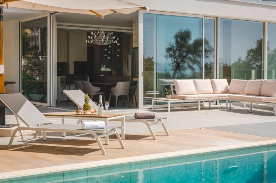 Enjoying the Sunbeds by the Pool at Villa Summer Fairy