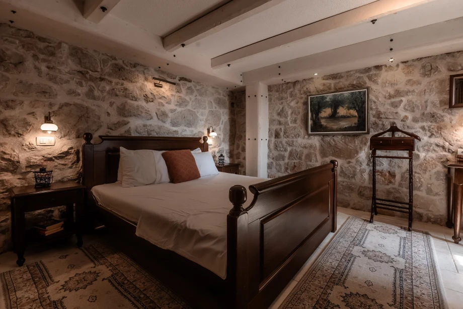 Spacious Bed in a Cozy Bedroom at Villa Andjelija