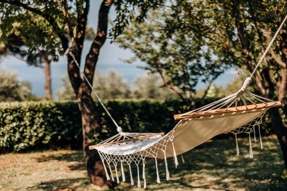 Charming Wooden Swing in the Garden at Villa Andjelija