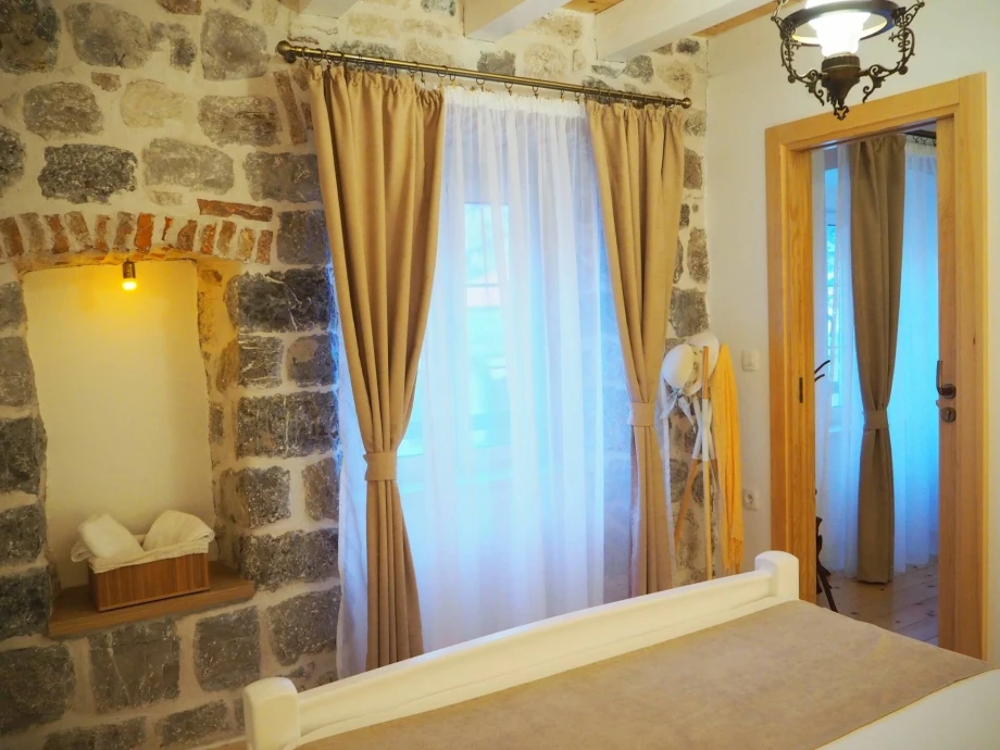 Charming Living Room with Exposed Stone Walls in Montenegro Villa