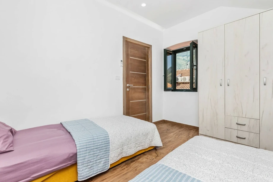Spacious Bedroom with Comfortable Furnishings
