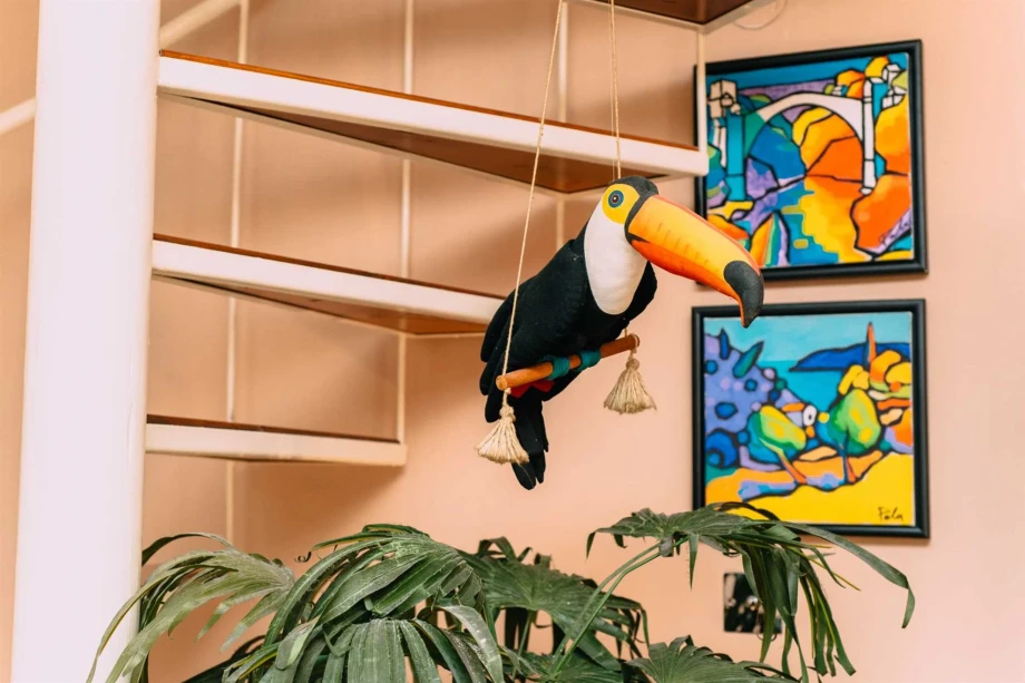 Villa Living Room with Unique Art Pieces and Bold Color Accents