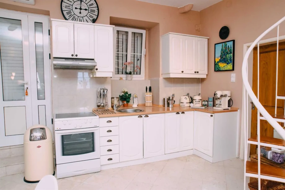 Fully Equipped Villa Kitchen with Modern Appliances and Sleek Design