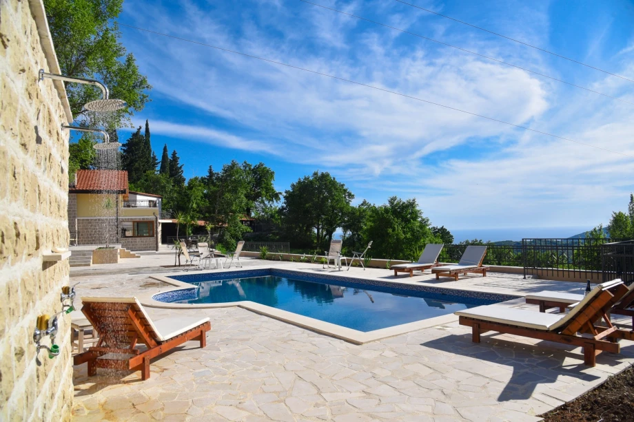 Relaxing outdoor pool area at the villa