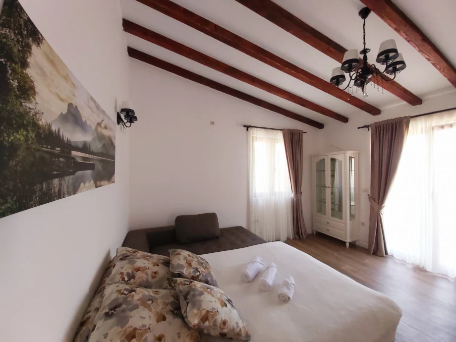Brightly lit room with modern furnishings in the villa