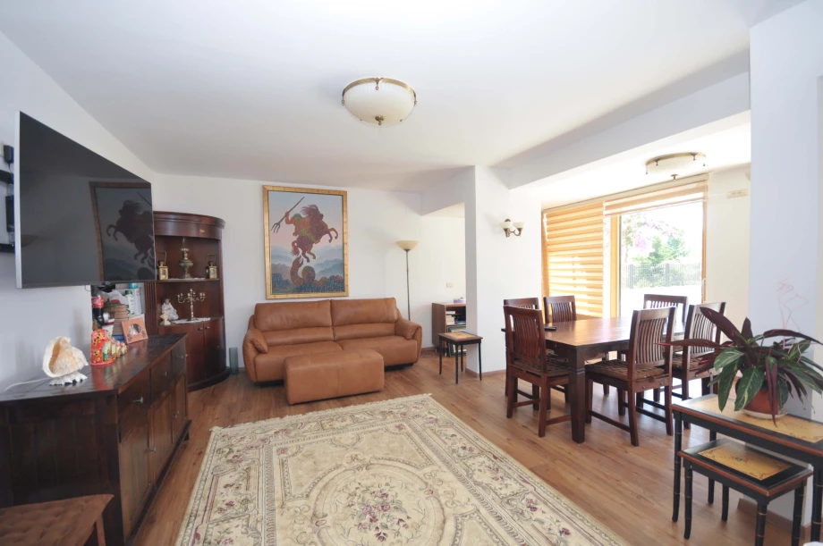 Spacious Living Room with Elegant Dining Table