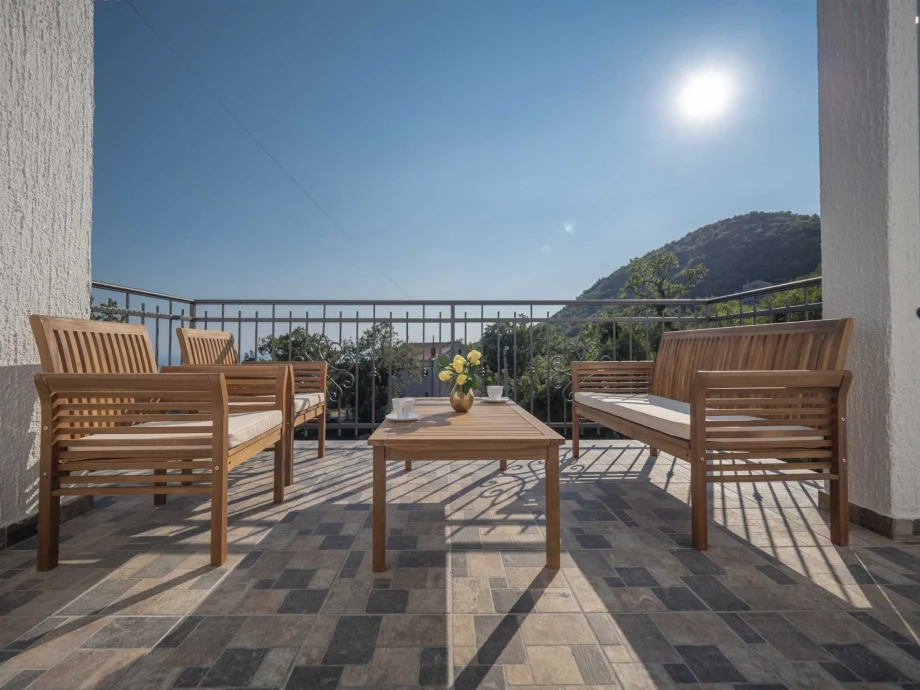 Spacious Villa Terrace with Stunning Views and Cozy Seating