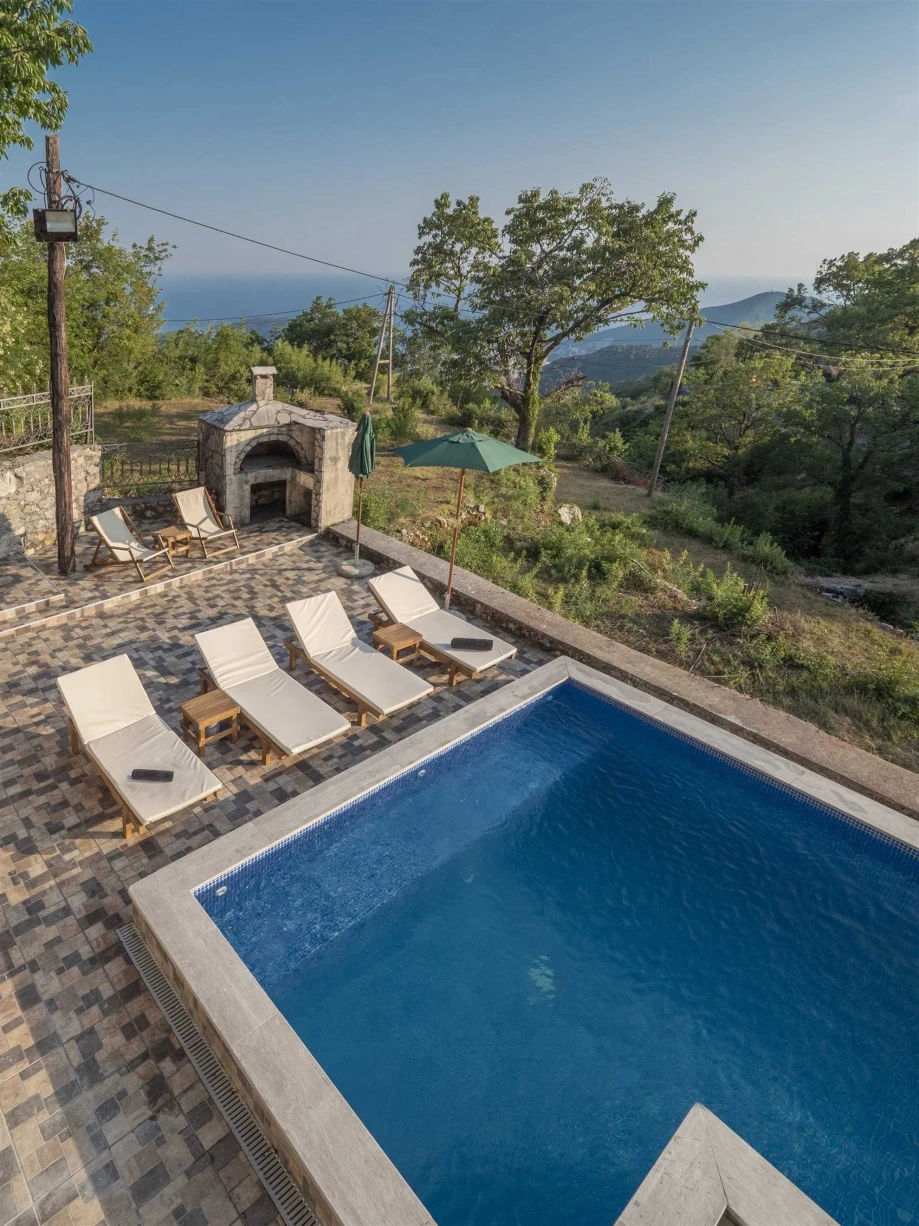 Serene Poolside Escape with Stunning Villa Views