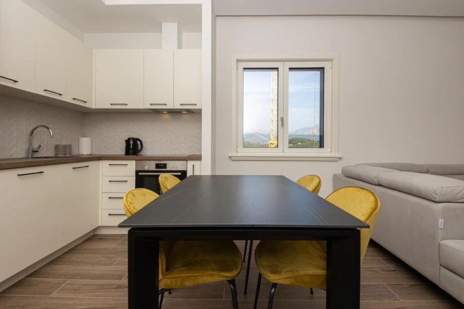 Elegant Dining Area with Stylish Table and Sophisticated Design