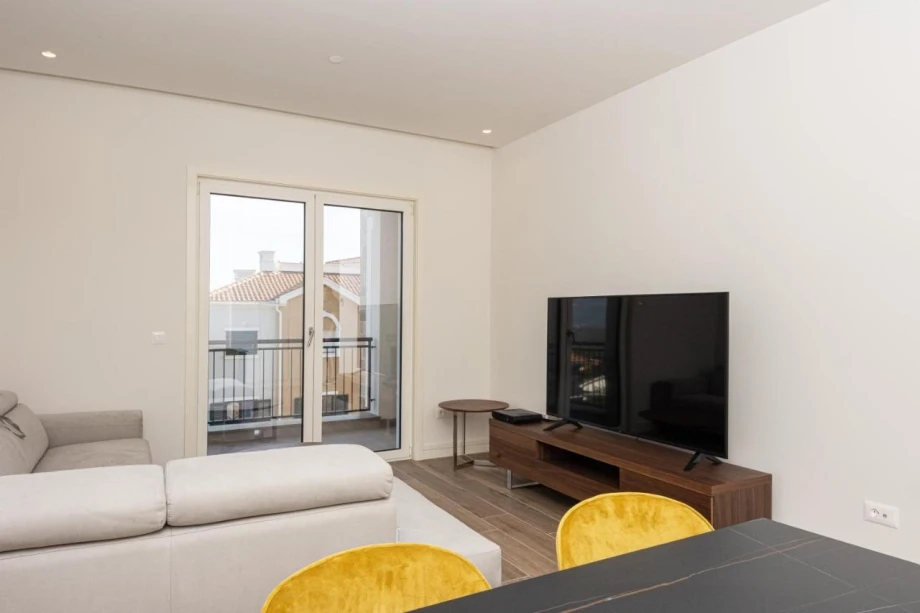 Spacious Living Room with Cozy Seating and Modern Decor