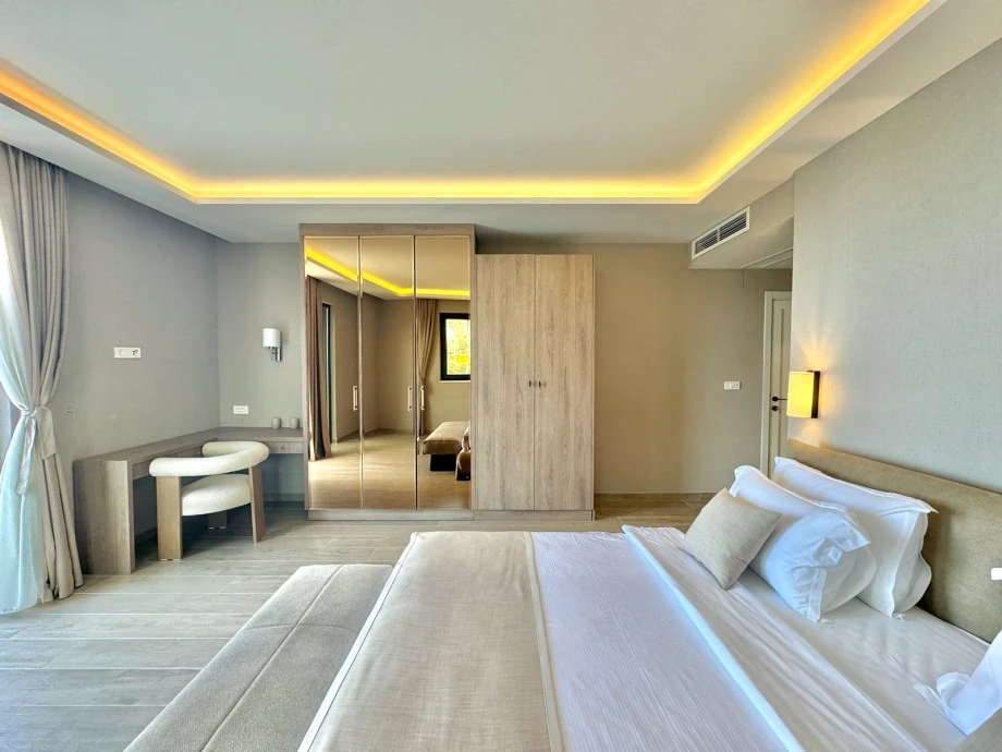 Beautiful Bedroom with Soft Lighting and Plush Bedding at Villa Solis