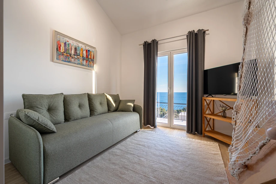 Cozy Living Area with Comfortable Sofa – Perfect Spot for Relaxation