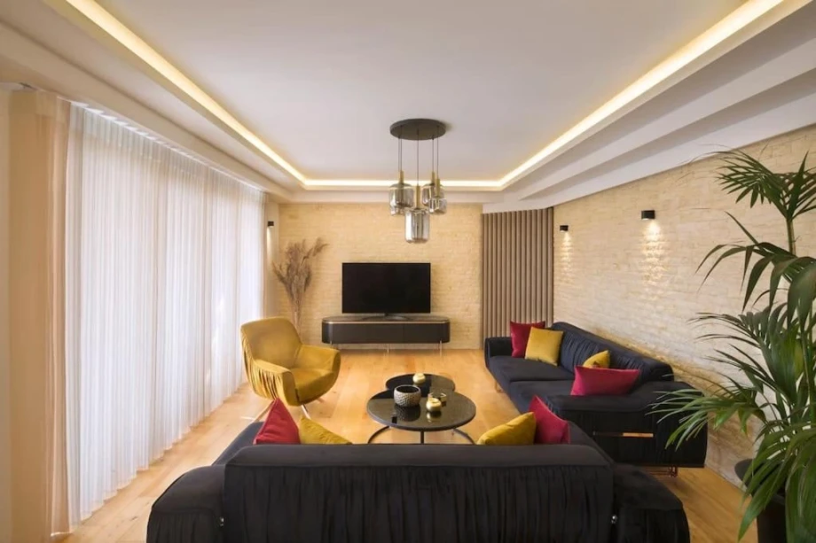 Spacious Living Room with Cozy Seating and Modern Touches