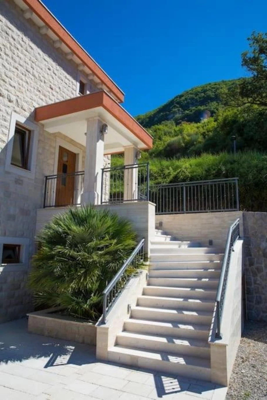 External Stairs Leading to Upper Terrace with Scenic Views