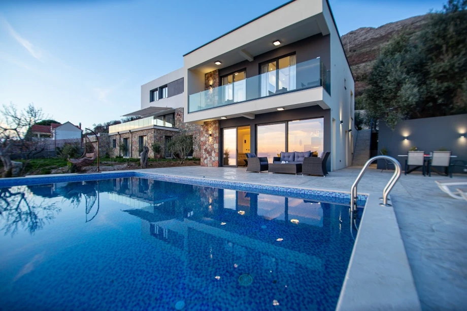 Outdoor Pool with Crystal Clear Water and Relaxing Lounge Area – Montenegro Villa