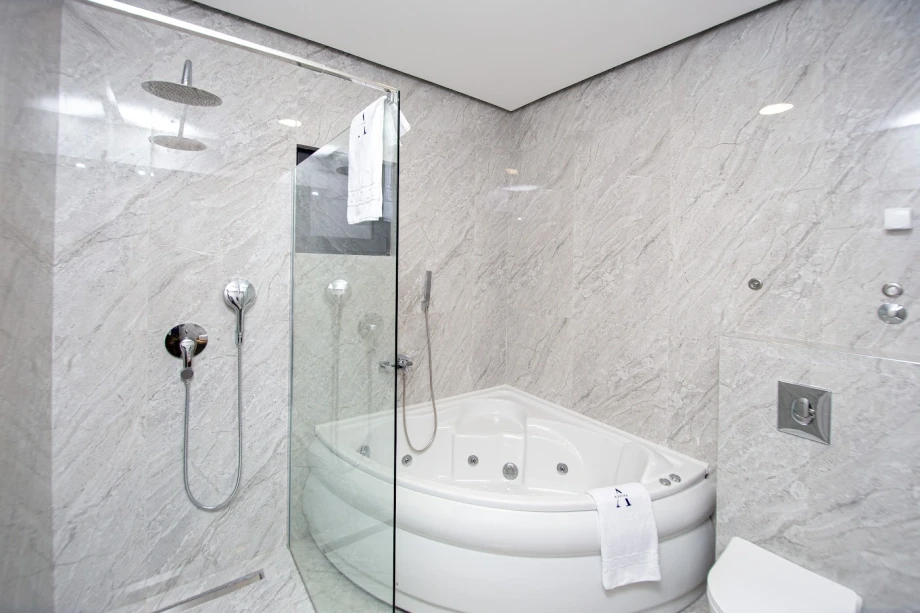 Walk-In Shower with Glass Enclosure and Modern Design – Montenegro Villa Bathroom